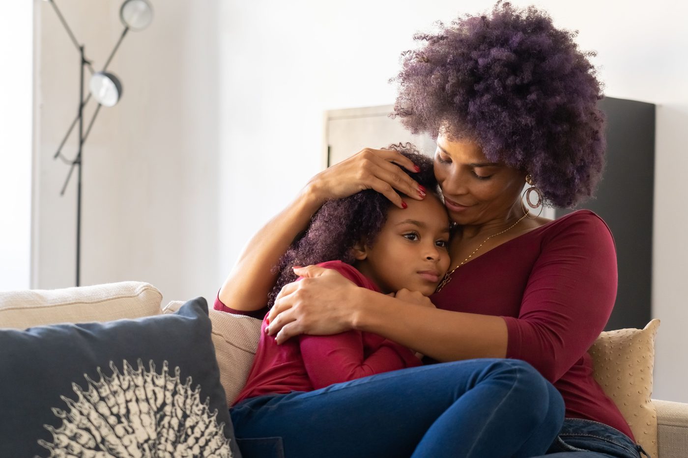 A mother and daughter sharing a warm hug